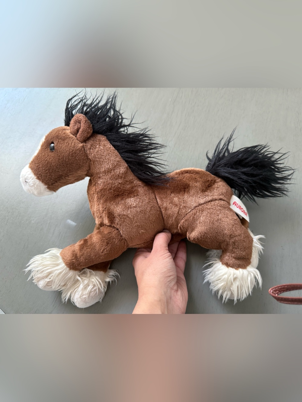12-inch "Captain the Clydesdale" Lying Horse Plush manufactured by Aurora World